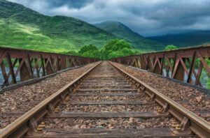 Train tracks on a bridge featuring a Thread Rod.