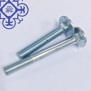 A couple of CARRIAGE BOLT,DIN603,4.8,WHITE ZINC and nylon nuts on a white surface.